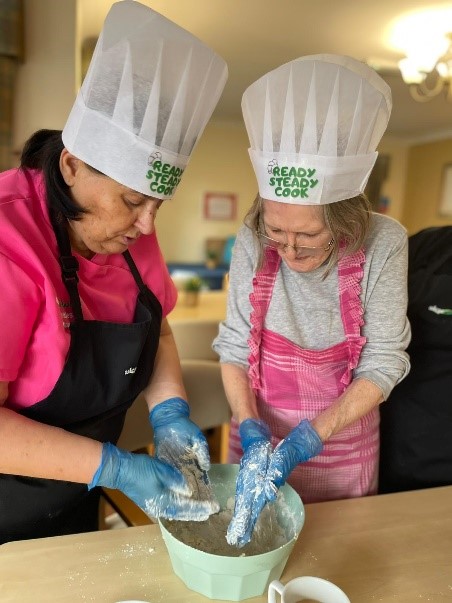 Douglas Court Resident Baking for Ready Steady Cook Competition