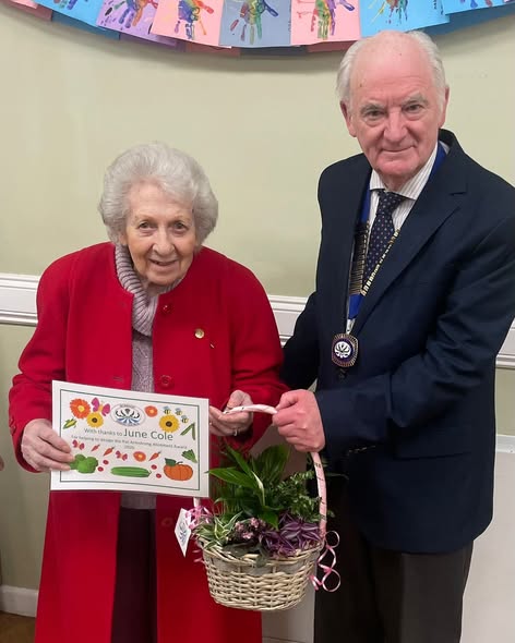 June, resident from Moat House collecting the Pat Armstrong Award