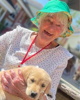 Puppies Visit Moat House Residents