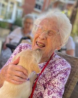 Puppies Visit Moat House Residents